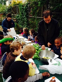 CWH first graders enjoy salad in the garden